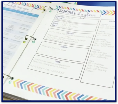 Maternity leave binder open showing the schedule at a glance